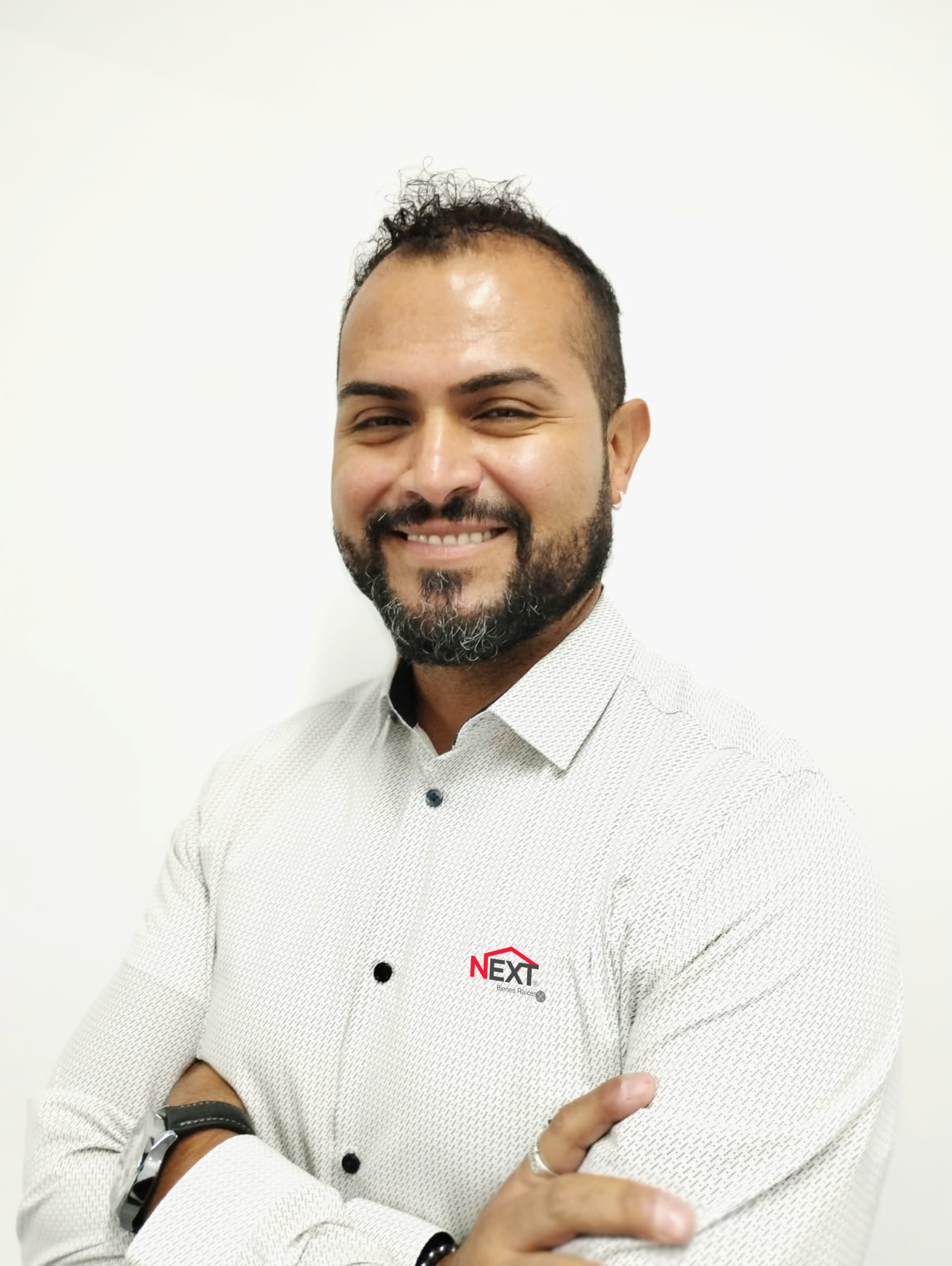 CARLOS T.
