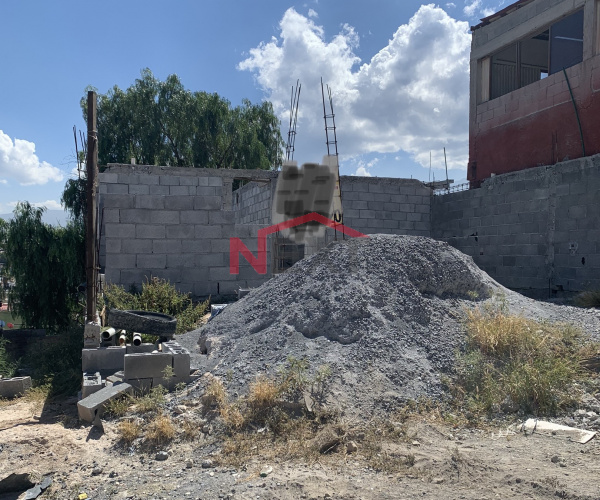 Terreno con construcción