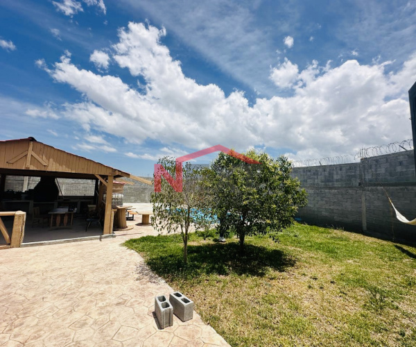 VENTA DE TERRENO CON PALAPA  AL ORIENTE